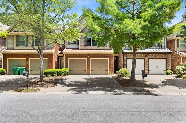 2957 Smith Ridge Trce, Peachtree Corners, GA 30071 - multi unit property with a garage, a standing seam roof, driveway, and brick siding