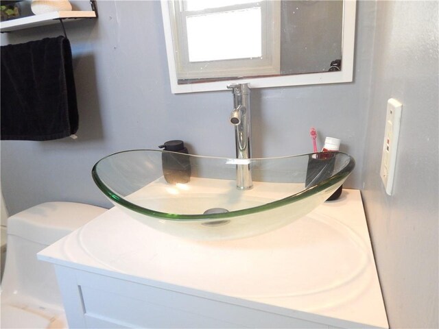 727 Regina Ct, Lawrenceville, GA 30043 - detailed view of toilet and vanity