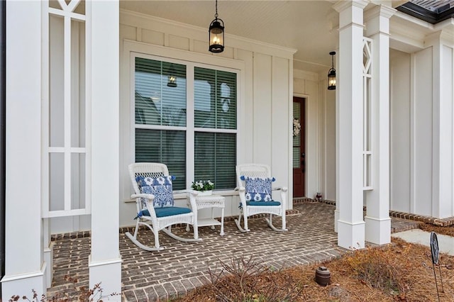 doorway to property featuring covered porch