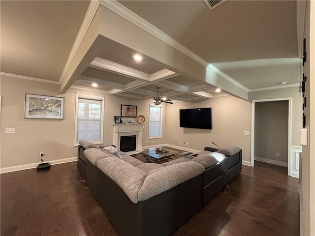 living area featuring baseboards, coffered ceiling, dark wood-style floors, ceiling fan, and a fireplace