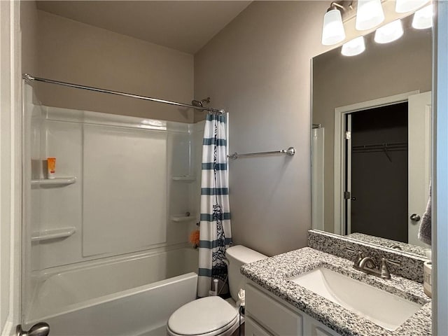 bathroom with toilet, shower / bath combo with shower curtain, a walk in closet, and vanity