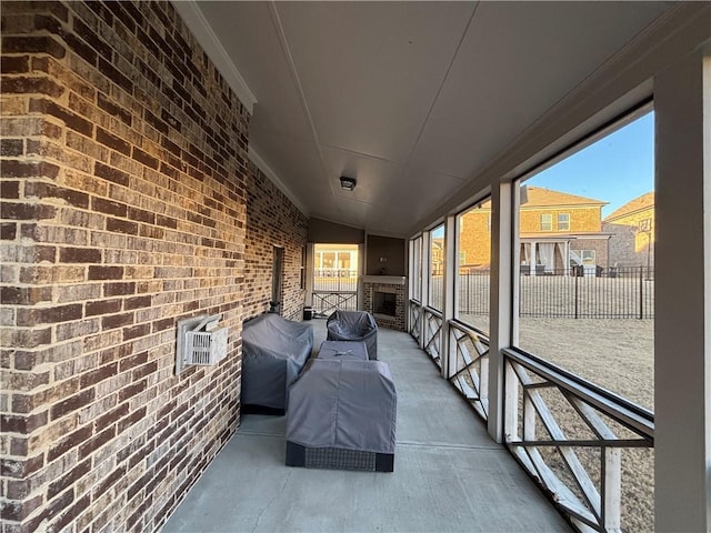 unfurnished sunroom with vaulted ceiling