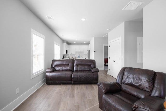 living room featuring light hardwood / wood-style floors