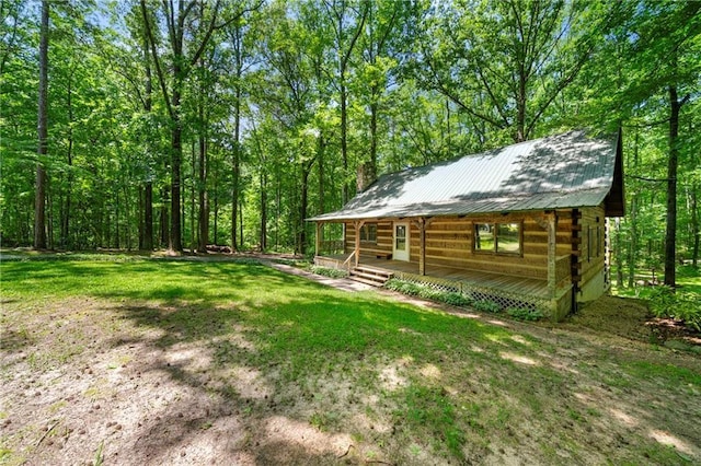 1975 Mack Rd, Douglasville, GA 30135 - view of green lawn featuring covered porch and a forest view