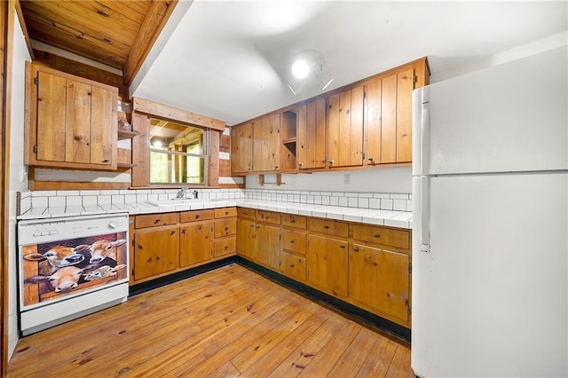 1975 Mack Rd, Douglasville, GA 30135 - kitchen with freestanding refrigerator, open shelves, a sink, light wood-type flooring, and dishwasher