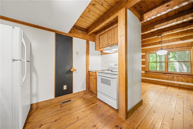 1975 Mack Rd, Douglasville, GA 30135 - kitchen with white appliances, wood ceiling with exposed beams, under cabinet range hood, light wood-style floors, and hanging light fixtures
