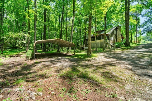 1975 Mack Rd, Douglasville, GA 30135 - view of yard with a detached carport and stairway
