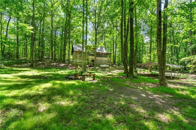 1975 Mack Rd, Douglasville, GA 30135 - view of grassy yard featuring a carport