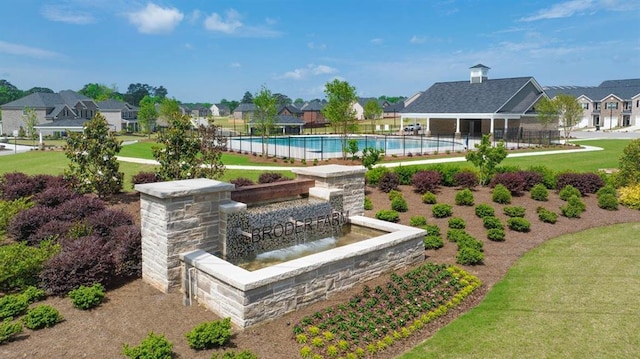 view of pool with a gazebo and a yard