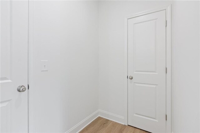 165 Mill Center Blvd Unit 108, Athens, GA 30606 - laundry room featuring light wood-style flooring and baseboards