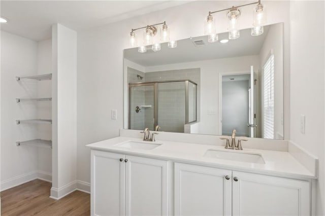 165 Mill Center Blvd Unit 108, Athens, GA 30606 - full bath featuring double vanity, a stall shower, wood finished floors, and baseboards
