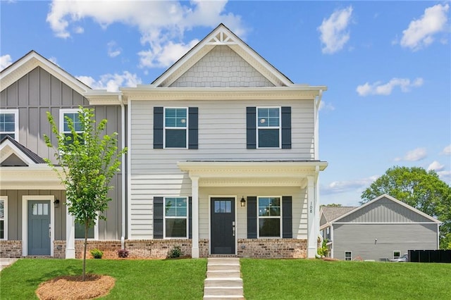 165 Mill Center Blvd Unit 108, Athens, GA 30606 - craftsman-style home with brick siding, a front yard, and board and batten siding