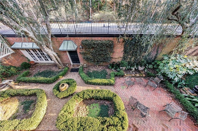 view of property's community with a patio area