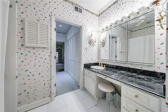 bathroom featuring vanity, tile patterned floors, ornamental molding, and a shower with shower curtain