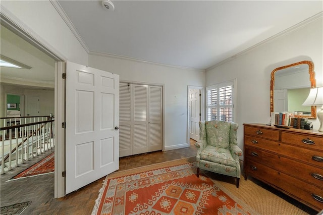 living area featuring ornamental molding