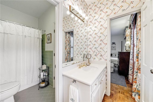 full bathroom with vanity, parquet flooring, shower / bathtub combination with curtain, and toilet