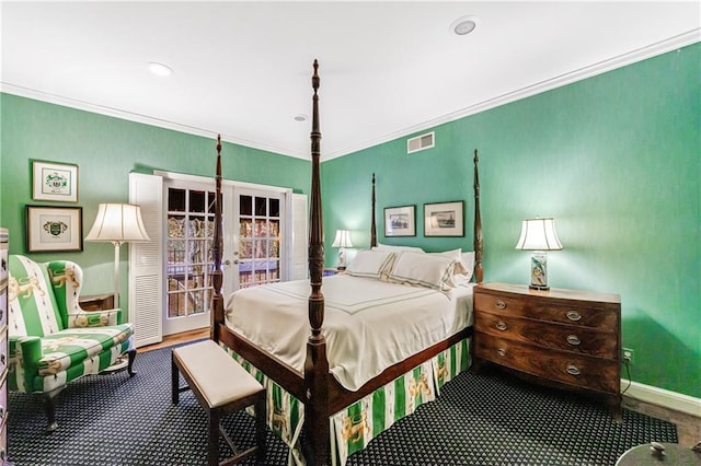 bedroom with crown molding and french doors