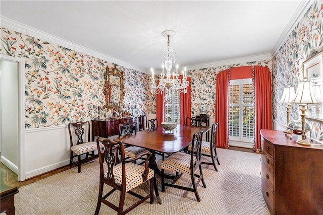 dining space featuring ornamental molding and a notable chandelier