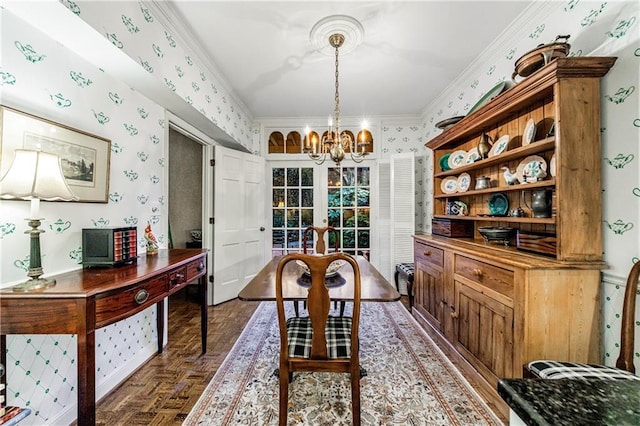 dining area featuring an inviting chandelier, parquet flooring, and ornamental molding