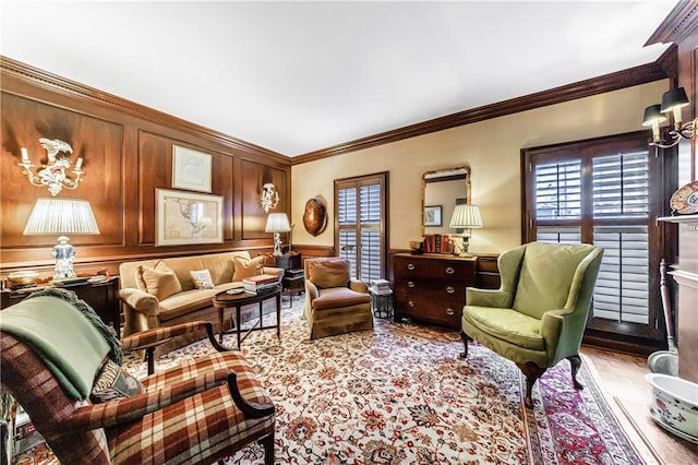 sitting room featuring crown molding