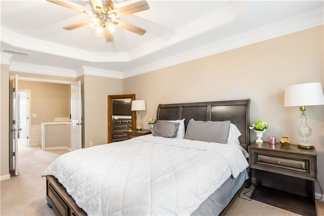 carpeted bedroom with crown molding, a raised ceiling, and ceiling fan