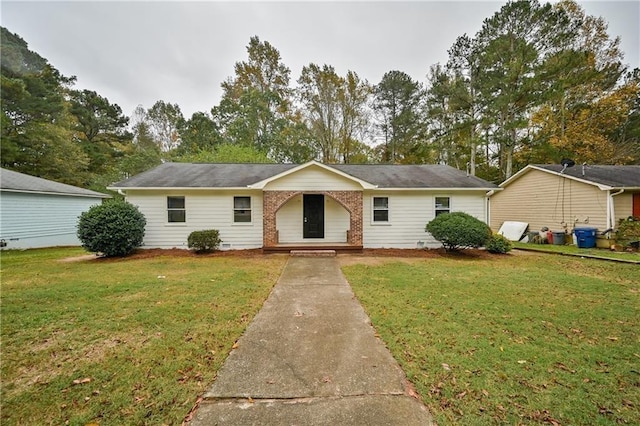 51 Ezzard St, Lawrenceville, GA 30046 - ranch-style house featuring a front yard and brick siding