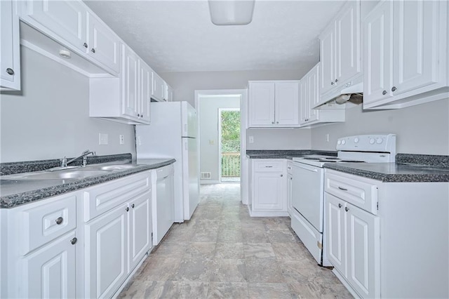 51 Ezzard St, Lawrenceville, GA 30046 - kitchen featuring white appliances, a sink, dark countertops, white cabinetry, and under cabinet range hood