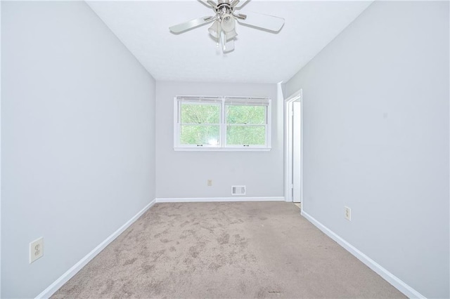 51 Ezzard St, Lawrenceville, GA 30046 - carpeted spare room with a ceiling fan and baseboards