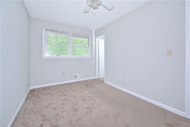 51 Ezzard St, Lawrenceville, GA 30046 - spare room featuring baseboards, ceiling fan, and carpet floors