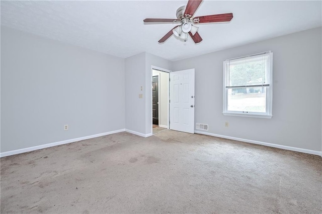 51 Ezzard St, Lawrenceville, GA 30046 - unfurnished room with carpet floors, baseboards, and a ceiling fan