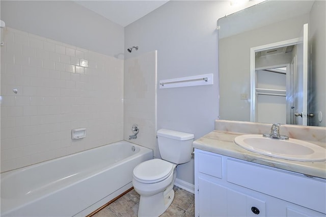 51 Ezzard St, Lawrenceville, GA 30046 - bathroom with toilet, vanity, shower / tub combination, and baseboards