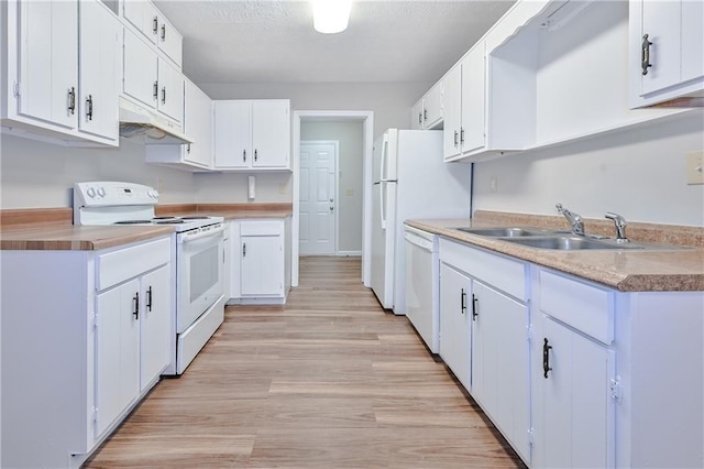 51 Ezzard St, Lawrenceville, GA 30046 - kitchen featuring white appliances, under cabinet range hood, a sink, and light countertops