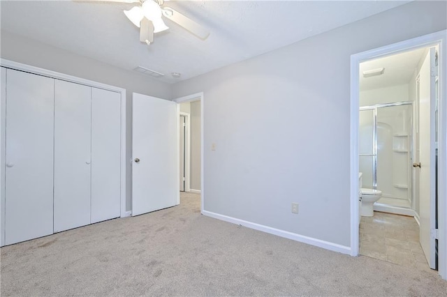 51 Ezzard St, Lawrenceville, GA 30046 - unfurnished bedroom featuring carpet floors, a closet, connected bathroom, and baseboards