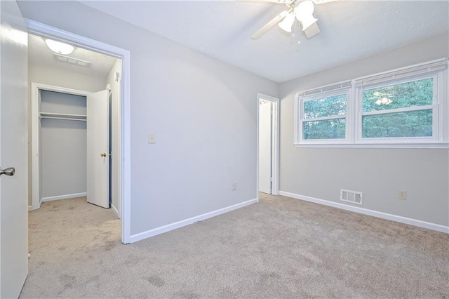 51 Ezzard St, Lawrenceville, GA 30046 - unfurnished bedroom featuring carpet, baseboards, ceiling fan, and a closet