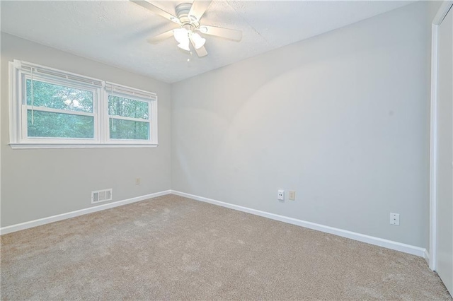 51 Ezzard St, Lawrenceville, GA 30046 - carpeted empty room featuring a ceiling fan and baseboards