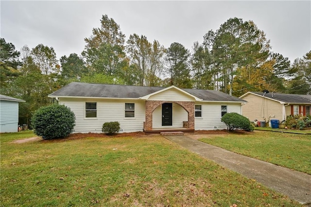 51 Ezzard St, Lawrenceville, GA 30046 - ranch-style home featuring a front lawn and covered porch