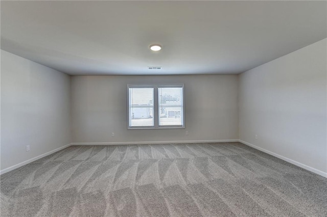 58 Longhorn Way, Auburn, GA 30011 - spare room with carpet floors, baseboards, and visible vents
