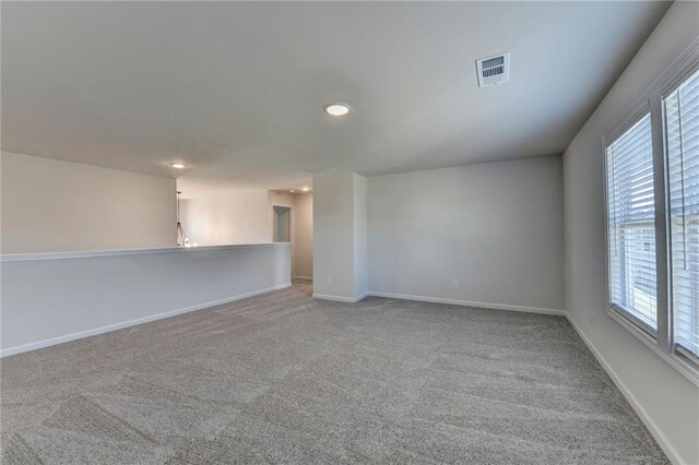 58 Longhorn Way, Auburn, GA 30011 - spare room with visible vents, carpet flooring, baseboards, and recessed lighting