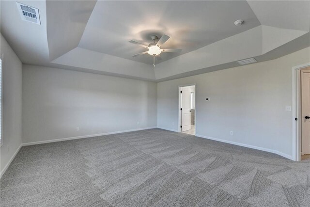58 Longhorn Way, Auburn, GA 30011 - carpeted empty room featuring a ceiling fan, baseboards, visible vents, and a raised ceiling