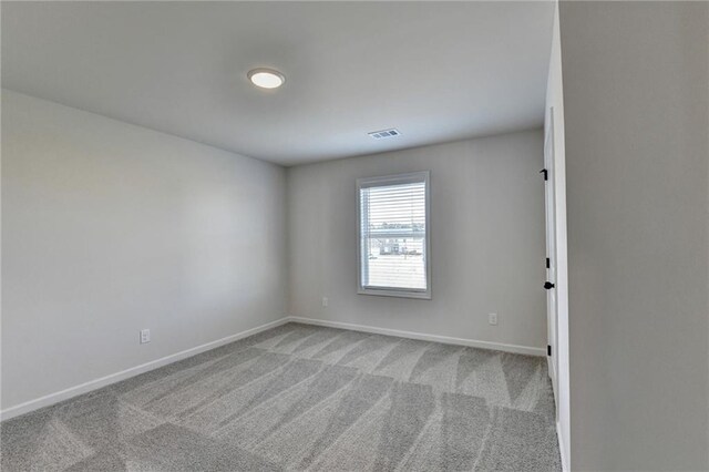 58 Longhorn Way, Auburn, GA 30011 - carpeted spare room with visible vents and baseboards