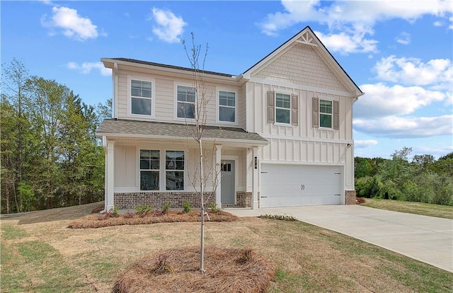 view of front facade with driveway, board and batten siding, an attached garage, a front lawn, and brick siding