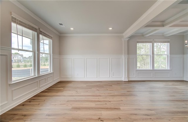 unfurnished room featuring visible vents, a decorative wall, light wood-type flooring, beamed ceiling, and recessed lighting