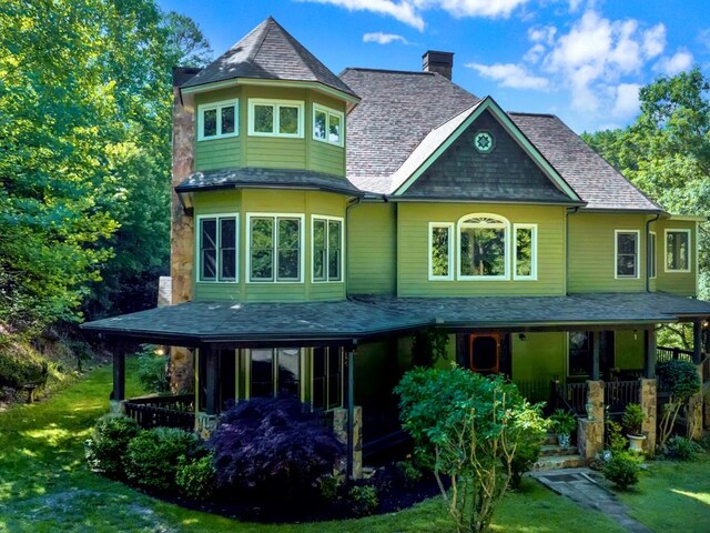 back of house with covered porch