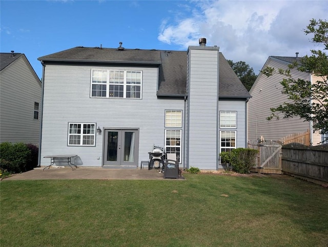 640 Dahoma Trl, Woodstock, GA 30188 - rear view of house with a patio area, a chimney, french doors, a gate, and a shingled roof
