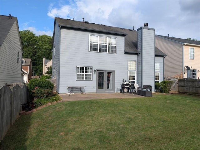 640 Dahoma Trl, Woodstock, GA 30188 - rear view of property featuring a patio, french doors, a chimney, and a fenced backyard