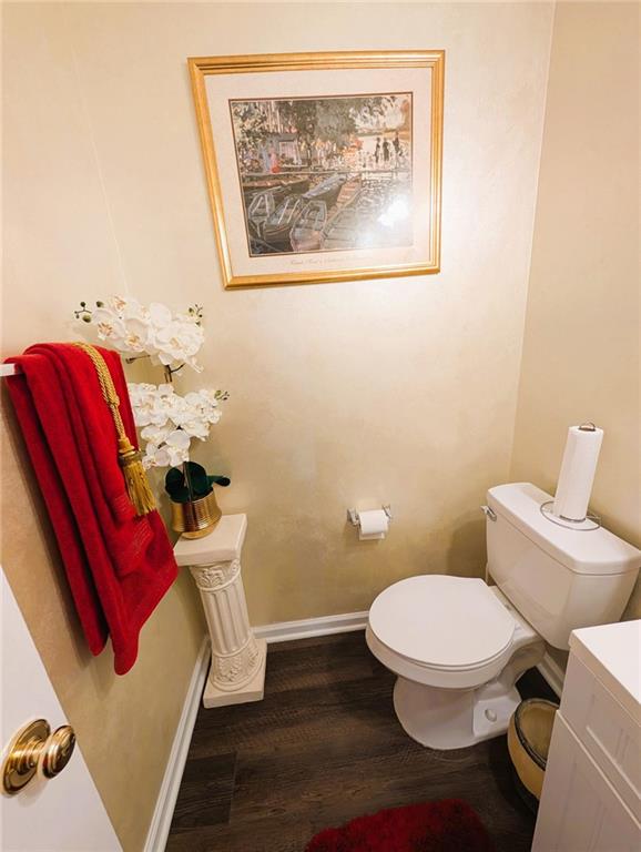 640 Dahoma Trl, Woodstock, GA 30188 - bathroom featuring wood finished floors and vanity