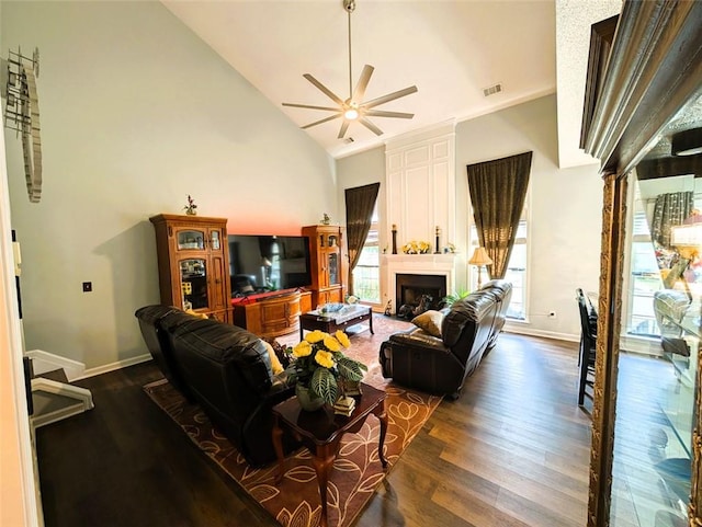 640 Dahoma Trl, Woodstock, GA 30188 - living room featuring a ceiling fan, dark wood-style flooring, high vaulted ceiling, and a fireplace