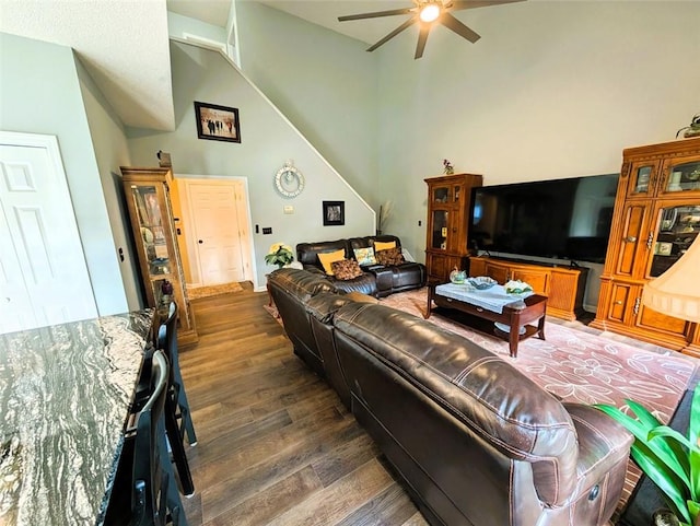 640 Dahoma Trl, Woodstock, GA 30188 - living area with a ceiling fan, wood finished floors, and vaulted ceiling