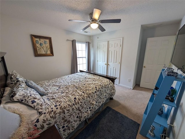 640 Dahoma Trl, Woodstock, GA 30188 - bedroom featuring light colored carpet, a closet, ceiling fan, and a textured ceiling
