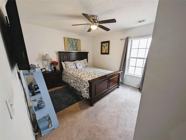 640 Dahoma Trl, Woodstock, GA 30188 - bedroom featuring light colored carpet, a textured ceiling, and ceiling fan